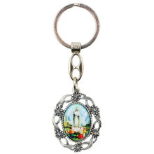 Load image into Gallery viewer, Our Lady of Fatima Oval Keychain with Floral Silver Tone Frame
