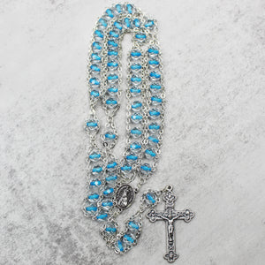 Our Lady of Fatima Rosary with Clear & Blue Beads, Medallion, and Case