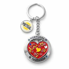 Load image into Gallery viewer, Portugal Spinning Heart Keychain – Enamel Floral Heart Design with Rotating Center
