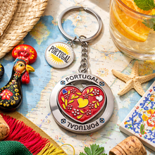 Load image into Gallery viewer, Portugal Spinning Heart Keychain – Enamel Floral Heart Design with Rotating Center
