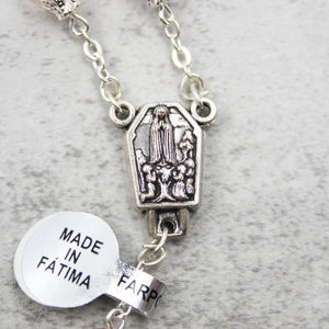 Our Lady of Fatima Rosary with Light Pink Beads, Medallion, and Case